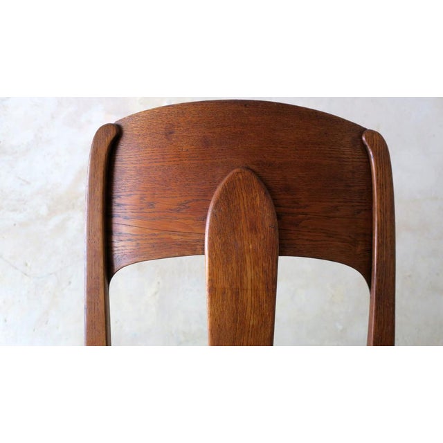 Striking art nouveau / Jugendstil side chair in solid oak, seat with original springs in very good condition, covered with...