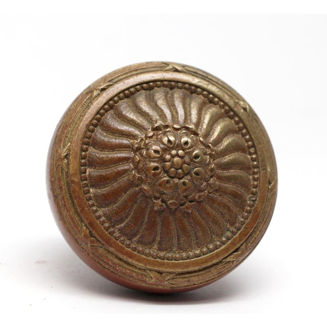 This concentric knob is made of bronze in an antique finish. It is part of the M-16000 group. The manufacturer and date of...