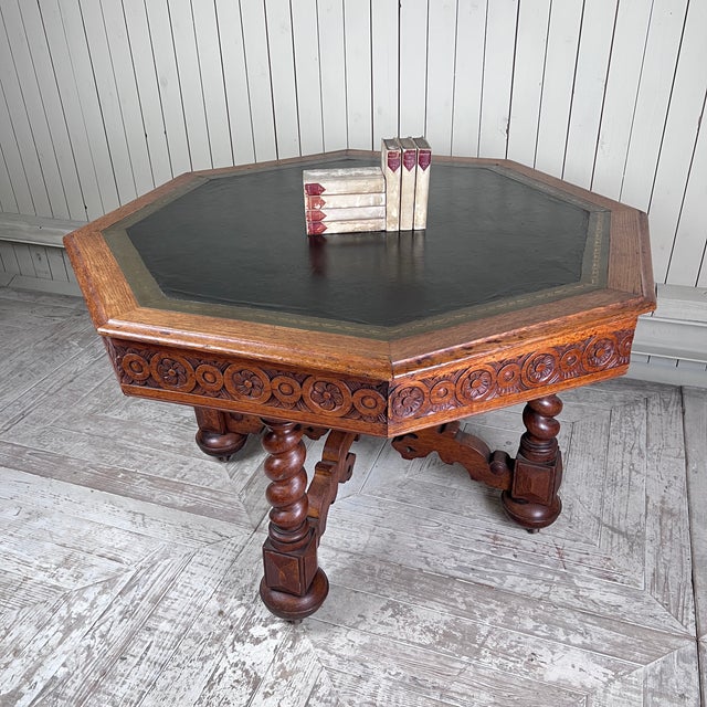 A superb quality victorian gothic revival octagonal library or centre table, stamped to one drawer by the renowned...