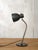 A model 98 desk lamp designed by h. Th. J. A. Busquet for hala zeist, the netherlands, in black. An original vintage...