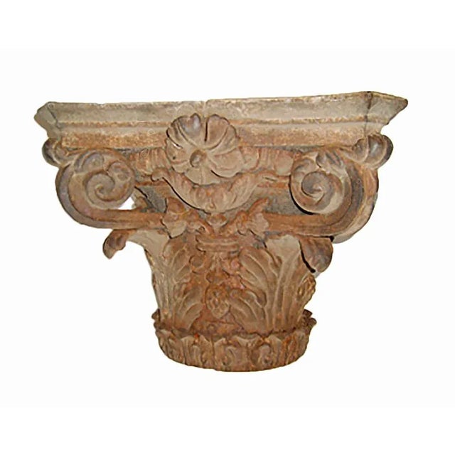 Antique, late 19th century cast iron composite capital. Floral decoration with a distressed finish.