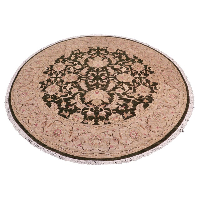 Transform your space with the Kafkaz Chobi Peshawar Round Hand‑Knotted Wool Rug, crafted by skilled Turkish artisans using...