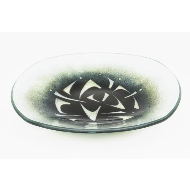 This lovely signed vintage glass bowl is from the American glass artist named Maurice Heaton. The design is unusual for...