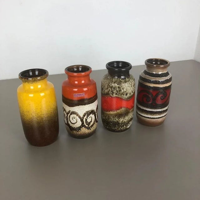 Set of four fat lava art vases. Producer: Scheurich, Germany. Decade: 1970s. These original vintage vases was produced in...