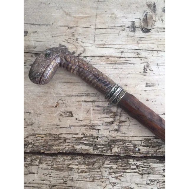 This is a vintage Argentine leather and silver horse crop. Such a cool display item!