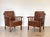 Pair of 1960s oak armchairs, imitation leather seat to be redone.