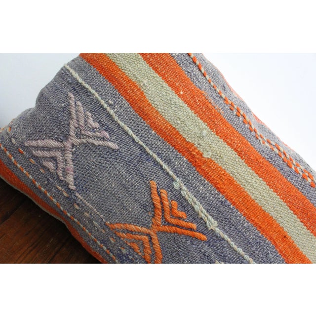 This Turkish pillow cover is made from the highest quality Vintage Kilim in 100% wool on the front. The back is covered in...