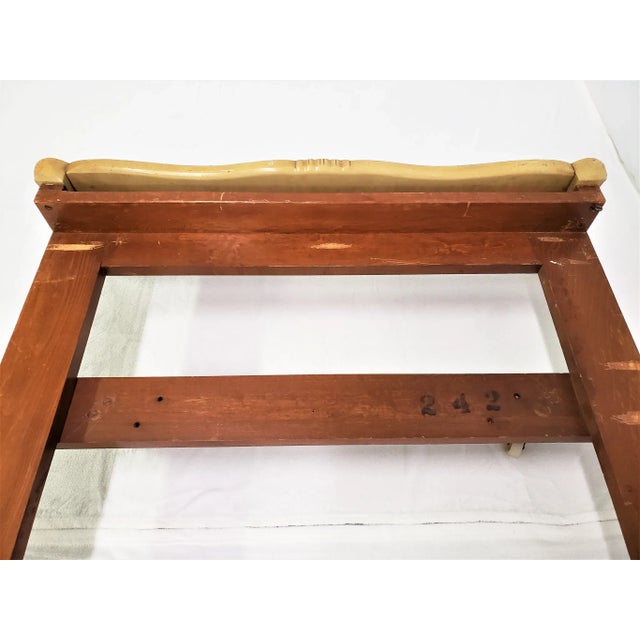 Bring a touch of romantic French charm to your bedroom with this exquisite 1970s bed frame. Featuring a cherry wood base...