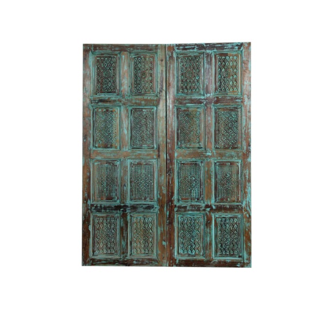 Infuse your home with eclectic charm and heritage artistry with these Boho Vintage Carved Wooden Doors from Mogul...
