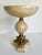 Here is a gorgeous marble alabaster display bowl with brass accents. As you can see, the base features a 3 legged detail...