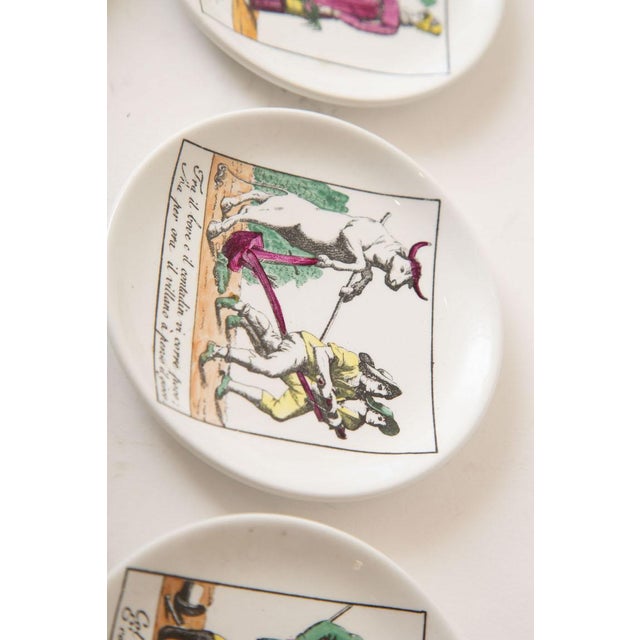 Vintage Piero Fornasetti Porcelain Colored Opera Coasters Il Mondo Alla Rovescia Set of 8 Italian MCM For Sale - Image 9 of 12