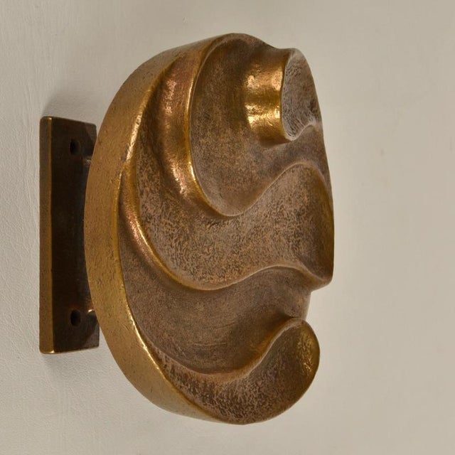 Single round door handle with curvaceous snake relief that is part textured. Cast bronze relief in perfect condition. The...