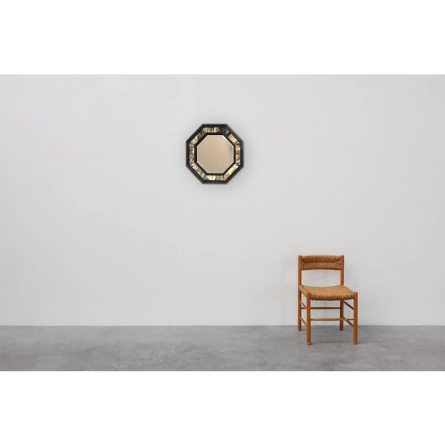 United Kingdom / 1980 / mirror / Redmile London / mirror and brass / Mid-century / Avant Garde An octagonal mirror with...