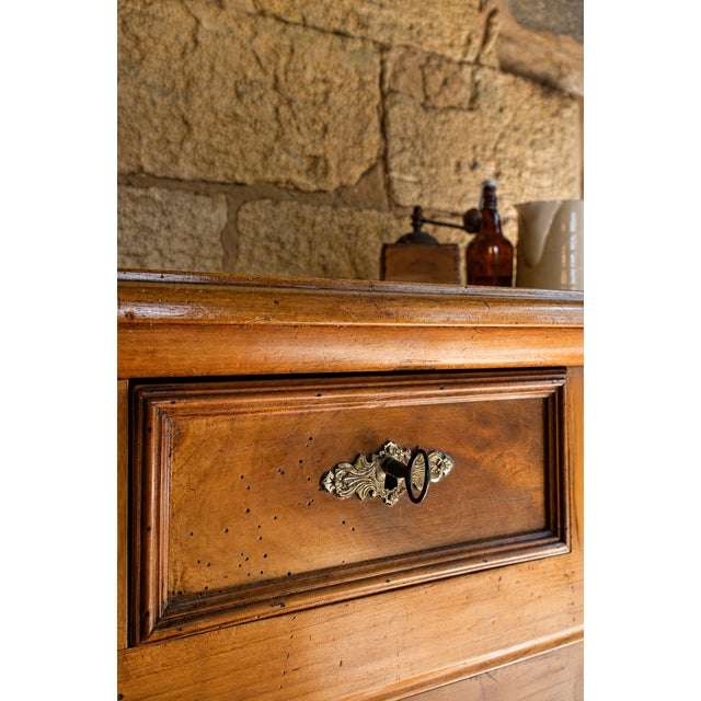 Authentic French rustic sideboard from the early 20th century, with beautifully balanced proportions inspired by the...