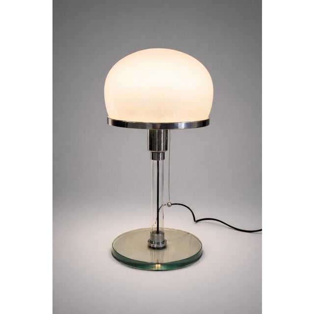Valentino table lamp, designed by Metalarte in 1976 and inspired by an earlier Bauhaus design from the 1920s. Glass base...