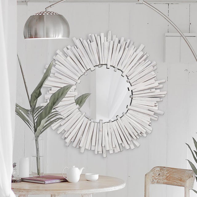 Inspired by coastal driftwood designs, our Durango Mirror features layers of wood pieces hand applied onto a round frame...