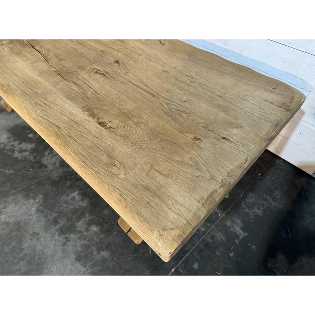 A table of this quality comes up from time to time but not often, made from solid Oak with a 10cm thick top. French in...