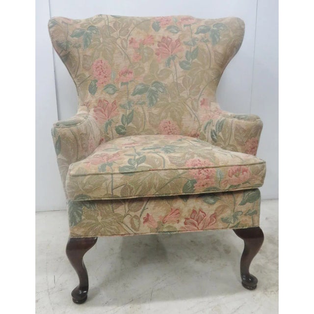 Wood feet, floral upholstered seat,