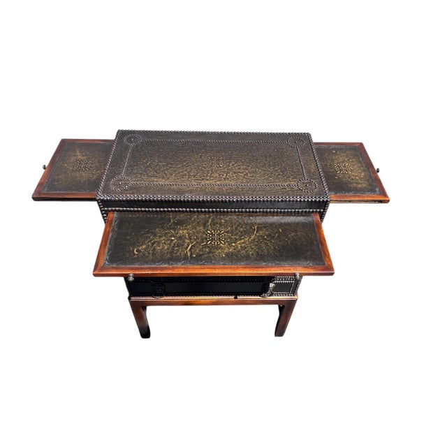 Gorgeous in the Style of Theodore Alexander, leather studded Campaign Chest Regency Style with three slip brown leather...