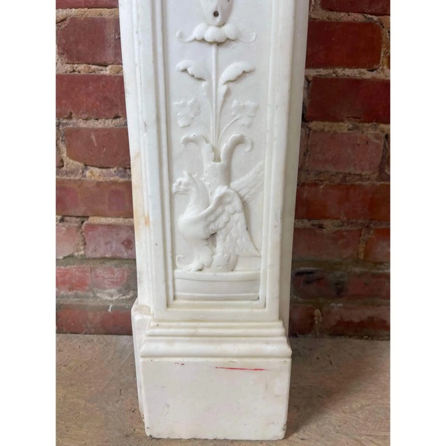 Lena & The Swan 59ʺW × 9ʺD × 45ʺH This exceptional fireplace surround is carved from a single selection of pure-white...