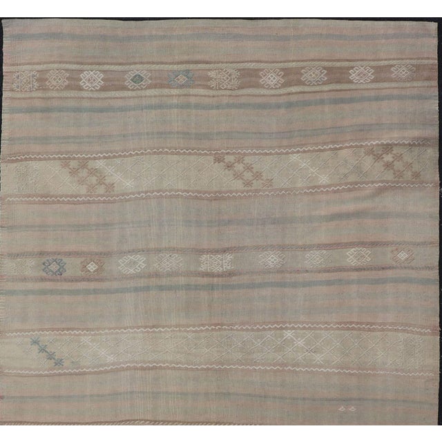 Flat-Weave Turkish Kilim with Embroideries in Earthy Tones and Hints of Pink. geometric stripe design Vintage Kilim from...