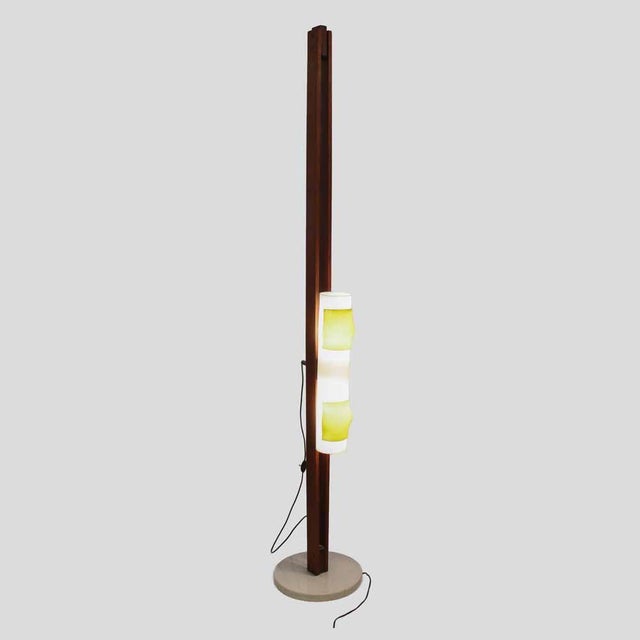 Arredoluce floor light , marble base holding two teak wooden structure, adjustable perspex shade height. late 1950s early...