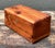 This iconic miniature cedar chest by Lane is a timeless piece of American craftsmanship, originally designed as a "hope...