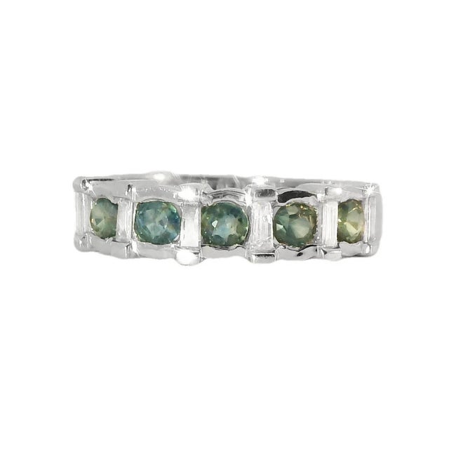 This gorgeous estate stacking band is crafted in 14K white gold and features a beautiful combination of deep blue...