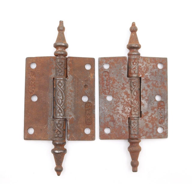 Victorian style door hinges made of cast iron with steeple tips, three knuckles, and a template hole pattern. The original...