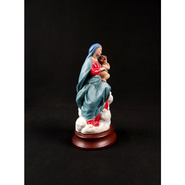 Vintage Painted Ceramic Statuette of the Virgin and Child from Foligno Celebrate your faith under the protection of the...