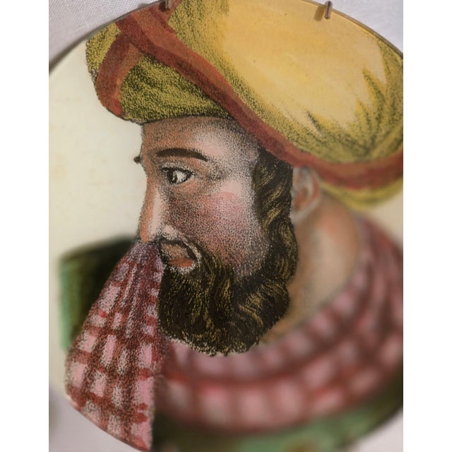 Decorative plate from the John Derian + Astier de Villatte collaboration depicting an image of an Arab man Made in Paris,...