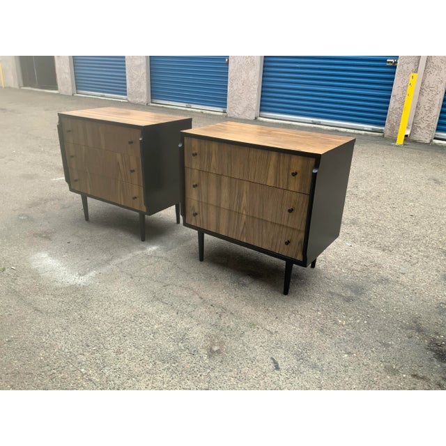 Mid century Kent Coffey nightstands. Pair is in good condition. Drawers work well. Knobs are all there. Top and drawer...