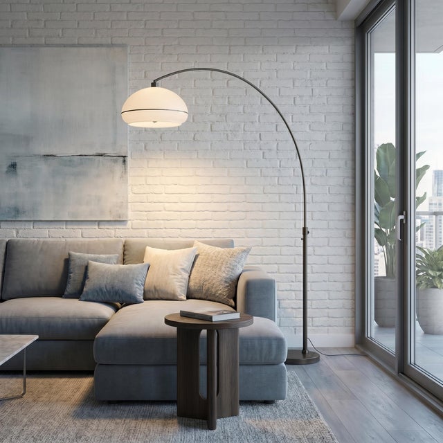 The Morelli Arc Lamp is a Peter Morelli-designed modern arc lamp featuring a sleek black nickel finish and a genuine black...