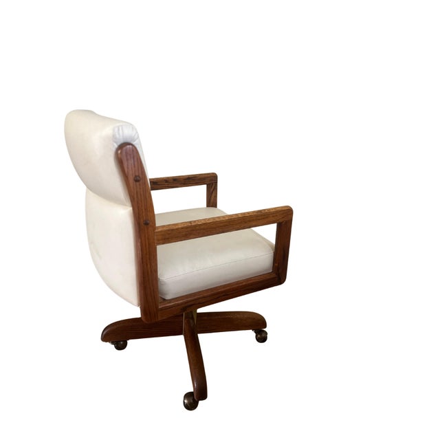 Vintage heavy solid vintage oak or maple 4 leg swivel chair Unknown brand Stem is steel brass plated. From 1970 or before...
