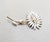 1950s goldtone prong set marquise and round white rhinestones in the shape of a flower brooch with security clasp. Marked...