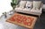 Enhance your home with this exquisite hand-knotted Super Kazak rug, crafted from fine hand-spun wool and dyed with all-...