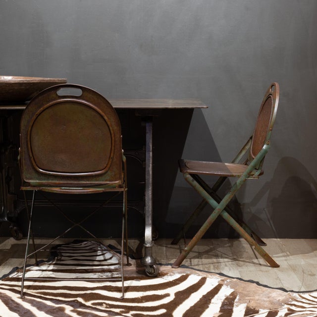 ABOUT Sold as a set only. Set of four steel prohibition era, Art Deco folding chairs with handles on the backrest as well...