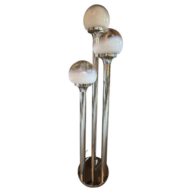 From Tallest: 55 1/2”H, 48 1/2”H, 40 1/2”H 14”W x 11 3/4”D A masterwork of Italian mid-century modern design, this...