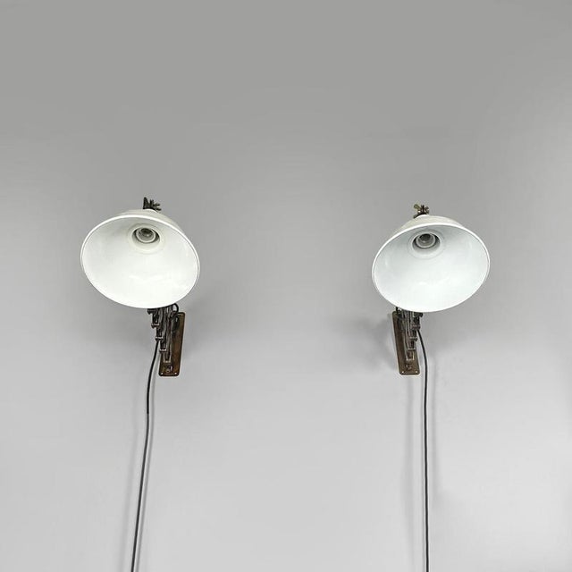 Italian mid-century modern pantograph wall lamps with white metal diffuser 1960s Industrial style pantograph wall lamps or...
