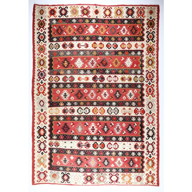 A very fine wool handwoven Sarkoy kilim, Circa 100 years old. it 's coming in good overall original condition. This...