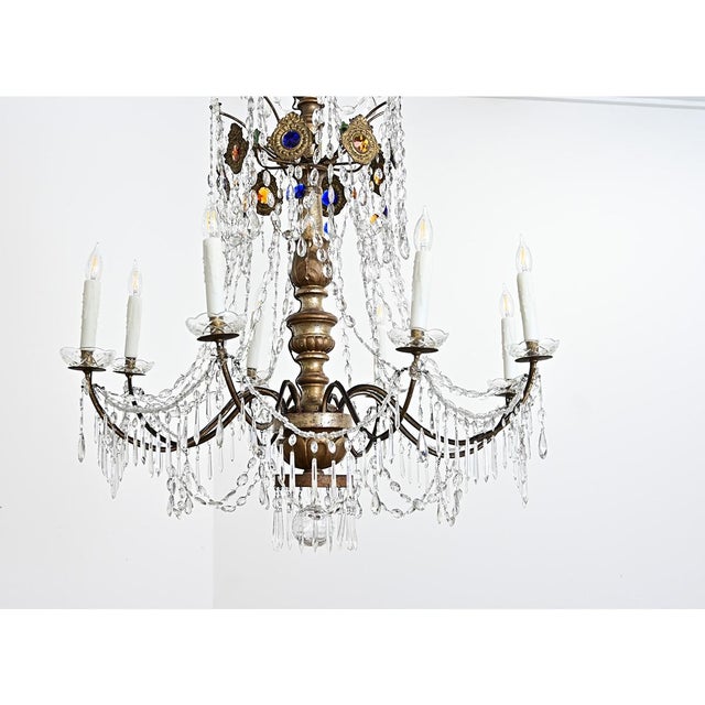 A spectacular and massive 18th century Genovese-style Italian chandelier decorated with transparent and jewel-tone...