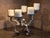 The candelabra features a detailed nautical octopus sculpture where the rising and swirling tentacles form platforms...