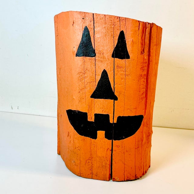 This is a whimsical Halloween Jack-o-Lantern motif Folk Art Wood Stump Low Stool. It’s painted in a Jack-o-Lantern motif...