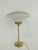 French table lamp made of solid brass polished, with mouth-blown glass shade. The lamp gives a cozy non-dazzling light....