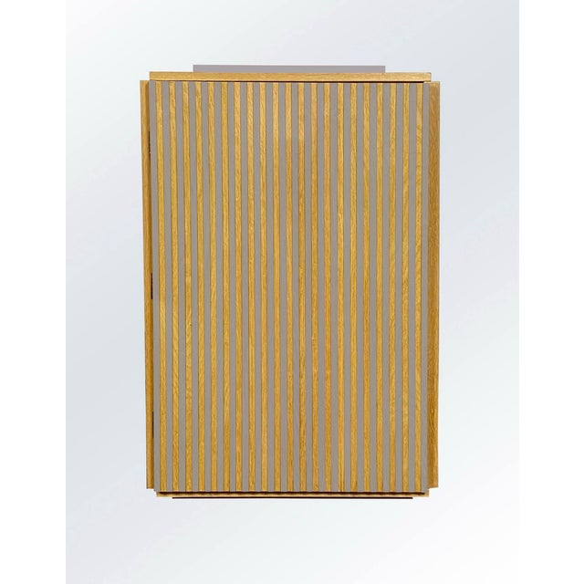 Light gray dice by Pietro Meccani, 2025. Beautiful oak sideboard with light gray painted parts; entirely in solid oak, it...