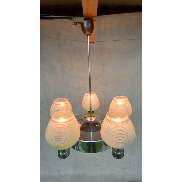 Beautiful napako chandelier in the bauhaus style, modernism, completely authentic. It has a chromed holder, opal glass...