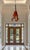 This 14‑inch tall by 10‑inch wide pendant light has a sculptural presence shaped entirely by the dialogue between its...