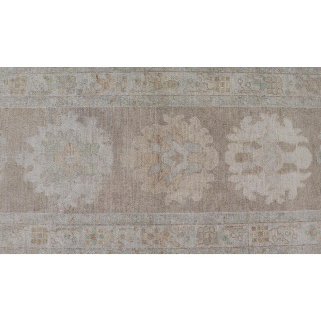 Early 21st Century Long Soft Oushak Runner With Sand Field and Pale Green and Blue Accents For Sale - Image 5 of 12