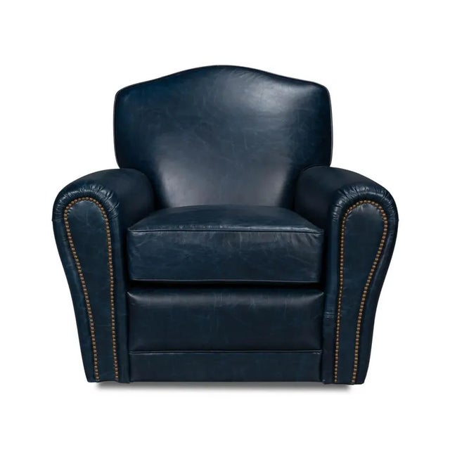 Art Deco style leather upholstered club chair, in Chateau Blue leather, with long rolled arms, a padded seat back, and...