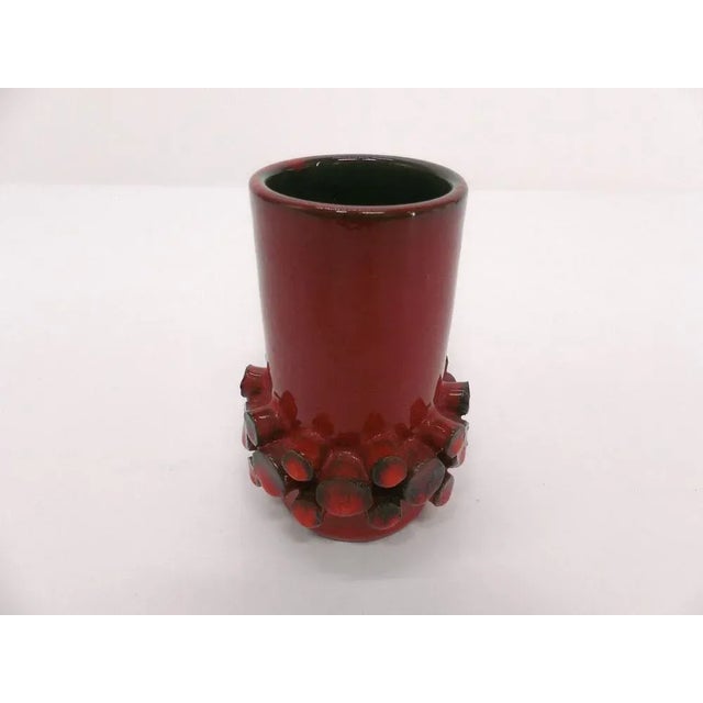 Mid-century Ceramano glazed brick red and orange ceramic Ceralux vase. Designed by Hans Welling for Ceramano. Simple...